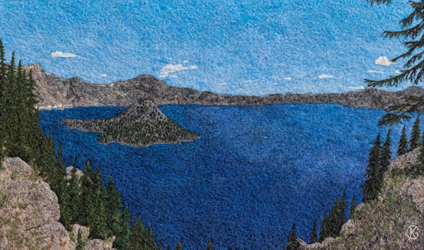 Felted wool artwork of a blue lake with an island in the middle of it